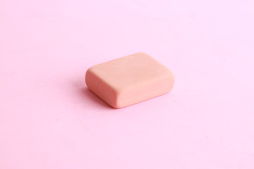 pink eraser on colorful background