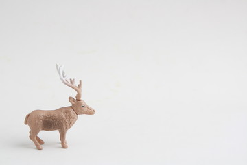 reindeer toy in color background