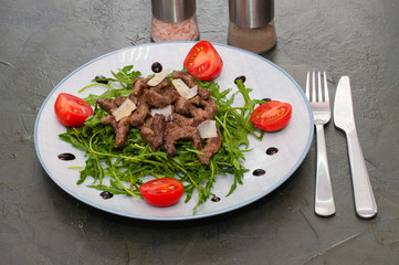 Grilled meat arugula, cheese, tomato sauce and spices