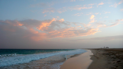 view of a secluded tropical beach in Cape Verde at sunset