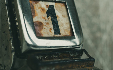 Day 1 number on metal rusty vintage calendar. Bad day concept.