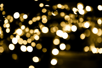 Obraz premium Festive overlay effect. Golden circles bokeh festive glitter dark background. Christmas, New Year, holidays design