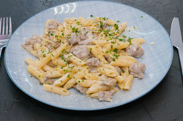 Italian pasta with meat, cheese, spices, parsley. Gourmet traditional food