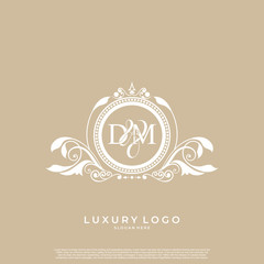 Logo Initial letter DM luxury vector mark, gold color elegant classical symmetric curves decor. editable file EPS10.