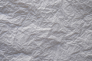 Flat lay, Close-up texture of Crumpled white grey paper background abstract. Detail texture of pattern with free space copy for text.