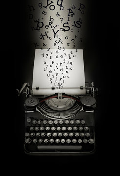 Fantasy recreation of letters falling down on typewriter and blank page