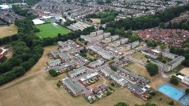 Aerial drone shot over a UK council estate.