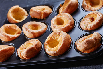 close-up of Yorkshire puddings in a baking tray