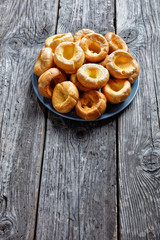 Yorkshire puddings on a plate, top view