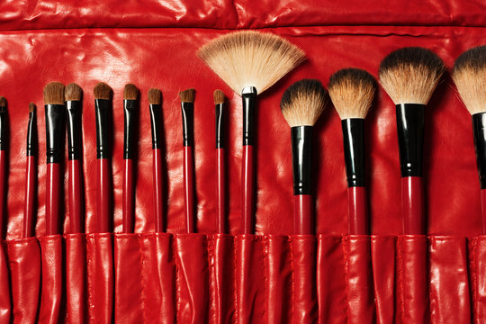 Set Of Red Makeup Brushes In Red Leather 