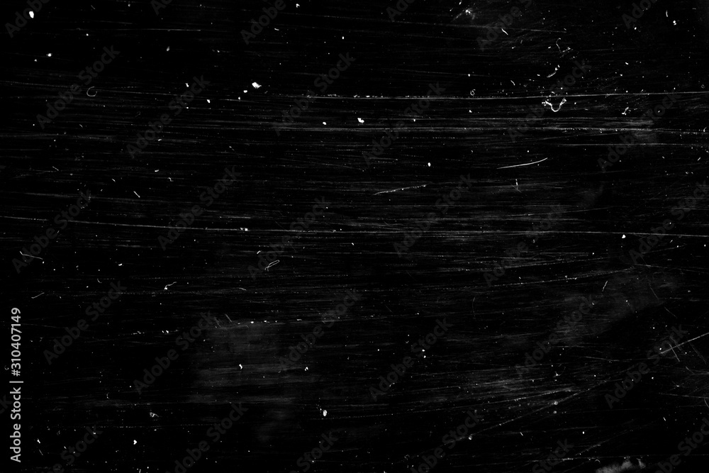 Poster texture with scratches on a black