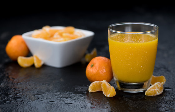 Fresh made Tangerine Juice (close-up shot)