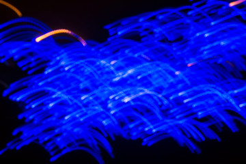 Christmas and New Year festive illumination on the city streets in blur with a shift