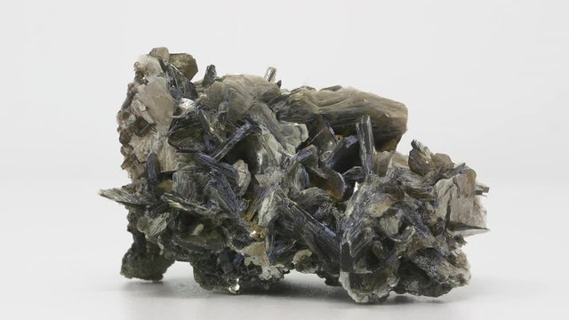 Extremely close view of Muscovite crystal formation. Rotating front to back.