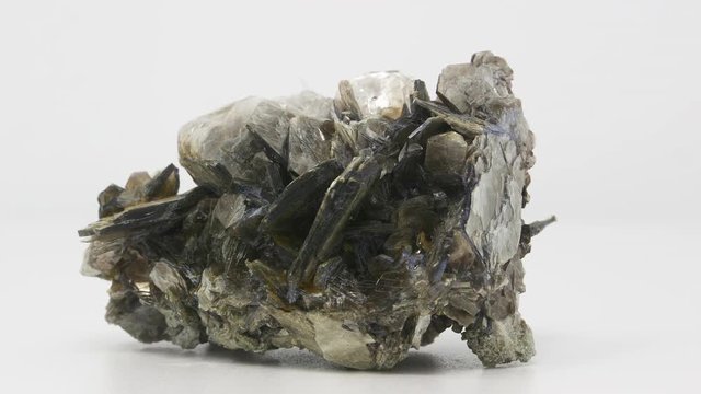 Extremely close view of Muscovite crystal formation. Rotating back to front.