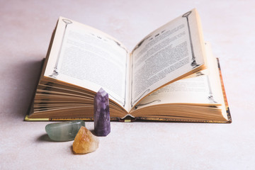 Obraz premium Mineral stones crystals and spell book