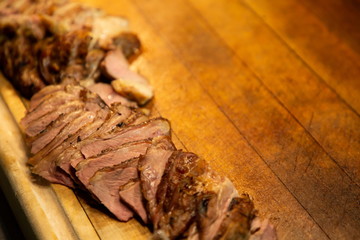 pork slice on wooden board with many copy space .