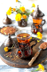 Turkish traditional tea on a white wooden background