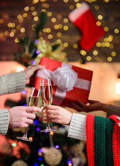Glass of champagne. Glass filled sparkling wine or champagne. Having nice time. Toast. Champagne couple glasses. Giving gift. Cheers concept. New year tradition. Merry christmas. Alcohol drink