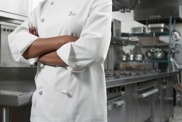Midsection Of Chef With Arms Crossed