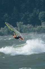 Man Jumping Whilst Windsurfing