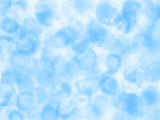 Abstract background with wet blue splashes.Watercolor style with gentle blots and stains.