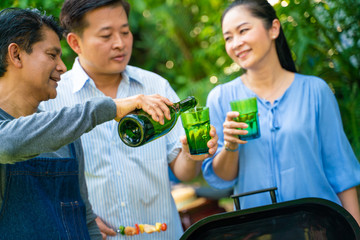 BBQ party group of senior people picnic in park