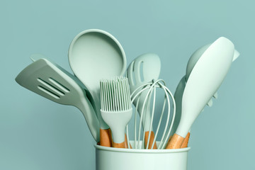 Kitchen utensils background with copyspace, home kitchen decor concept, kitchen tools, rubber...