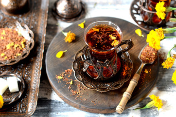 Turkish traditional tea on a white wooden background
