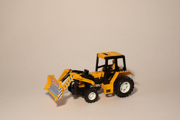 Plastic toys for children, construction machinery yellow