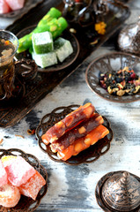 Turkish delight and tea on a light background