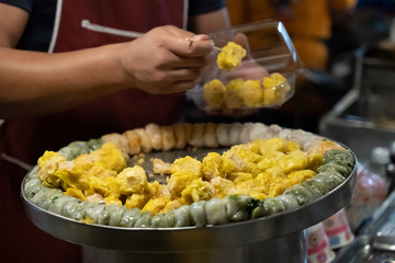 Hot dumplings in battered steamed on the gas stove