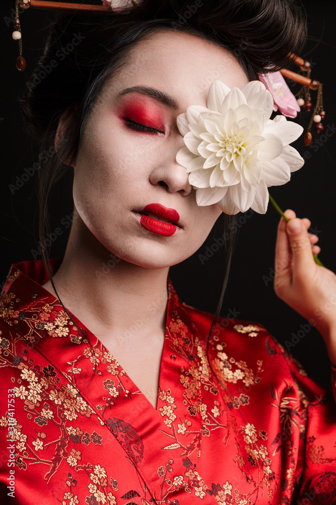 Sticker Image of beautiful geisha woman in japanese kimono holding flower