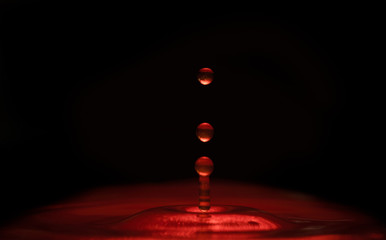 glowing red dropping liquid