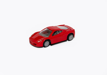 Red sports car on a white background