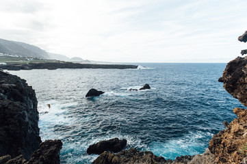 Breaking waves on the coast of Tenerife island, Canary islands, Atlantic ocean, Spain