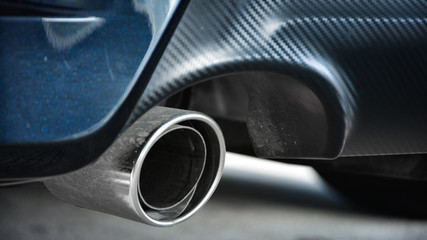 Close-up car exhaust pipe,Exhaust pipe of a diesel car,New generation of sportive mufflers,Double...