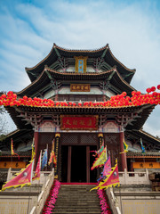 Fototapeta premium Traditional Chinese pagoda on the grounds of a Taoist temple in Hainan, China,