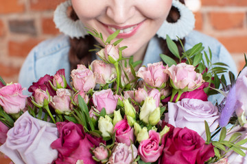 Bouquet of flowers on a background of smiles.