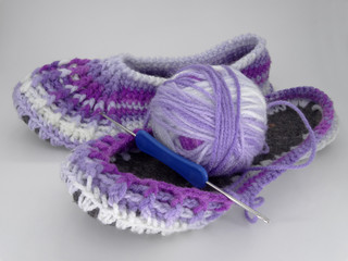 Knitted Slippers made of gradient wool yarn.