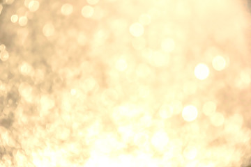 Abstract bokeh light with flare. Christmas concept to present celebration wallpaper decor with beautiful glitter and sparkle bubbles in blur or defocus style for web design.