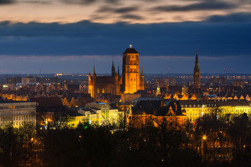 Fototapeta na wymiar Beautiful cityscape of Gdansk with St. Mary Basilica and City Hall at dawn, Poland.