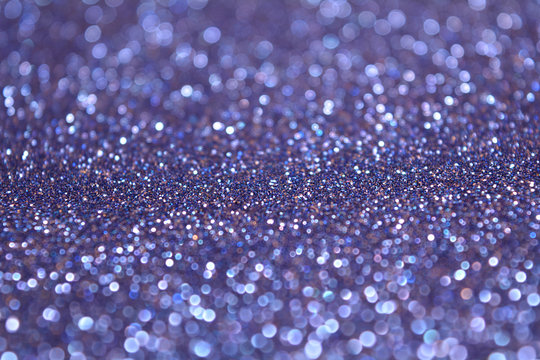 Magic Abstract Sparkle Glitter Lights Background. Sapphire Blue Color. Shine Bokeh Effect. For party, holidays, celebration.