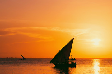 Sailboat at sunset. Beautiful background for posters, blogs, web design. Travel and vacation concept.