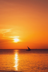 Sailboat at sunset. Beautiful background for posters, blogs, web design. Travel and vacation concept.