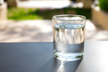 a glass of clean water in the fresh air