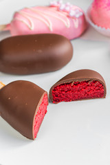 glazed red sponge cake. chocolate glaze. chocolate cake