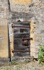 Door. Wooden. Rusty. Stone. Wall