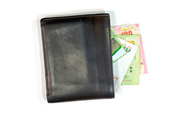 brown leather wallet with credit card (visa) and thai banknotes. Wallet with cash and credit card. Choose to buy or shoping.