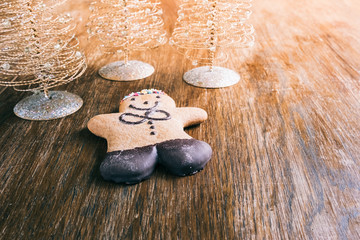 ginger bread man on a wooden table